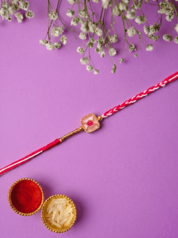 Elegant Gold Color Square Gemstone Designer Bhai Rakhi