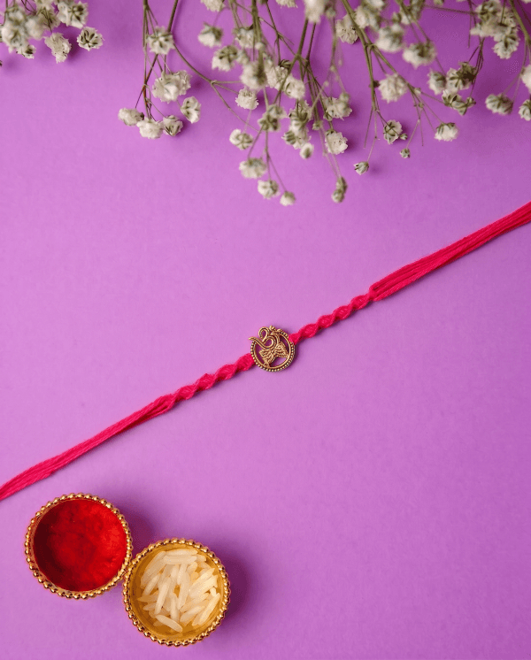 Golden Color Om Embossed Bhai Rakhi