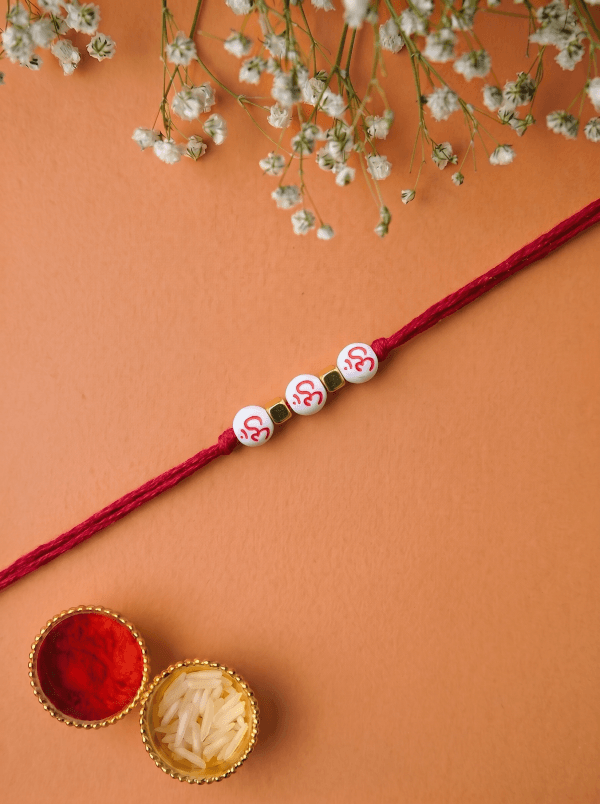 Handmade Auspicious Triple Om Designer Kids Rakhi