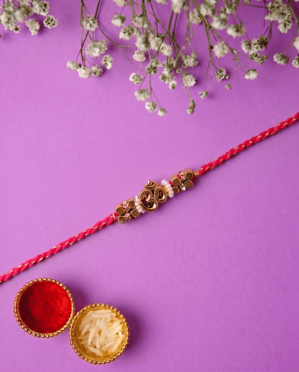 Royal Antique Gold Om Bhai Rakhi