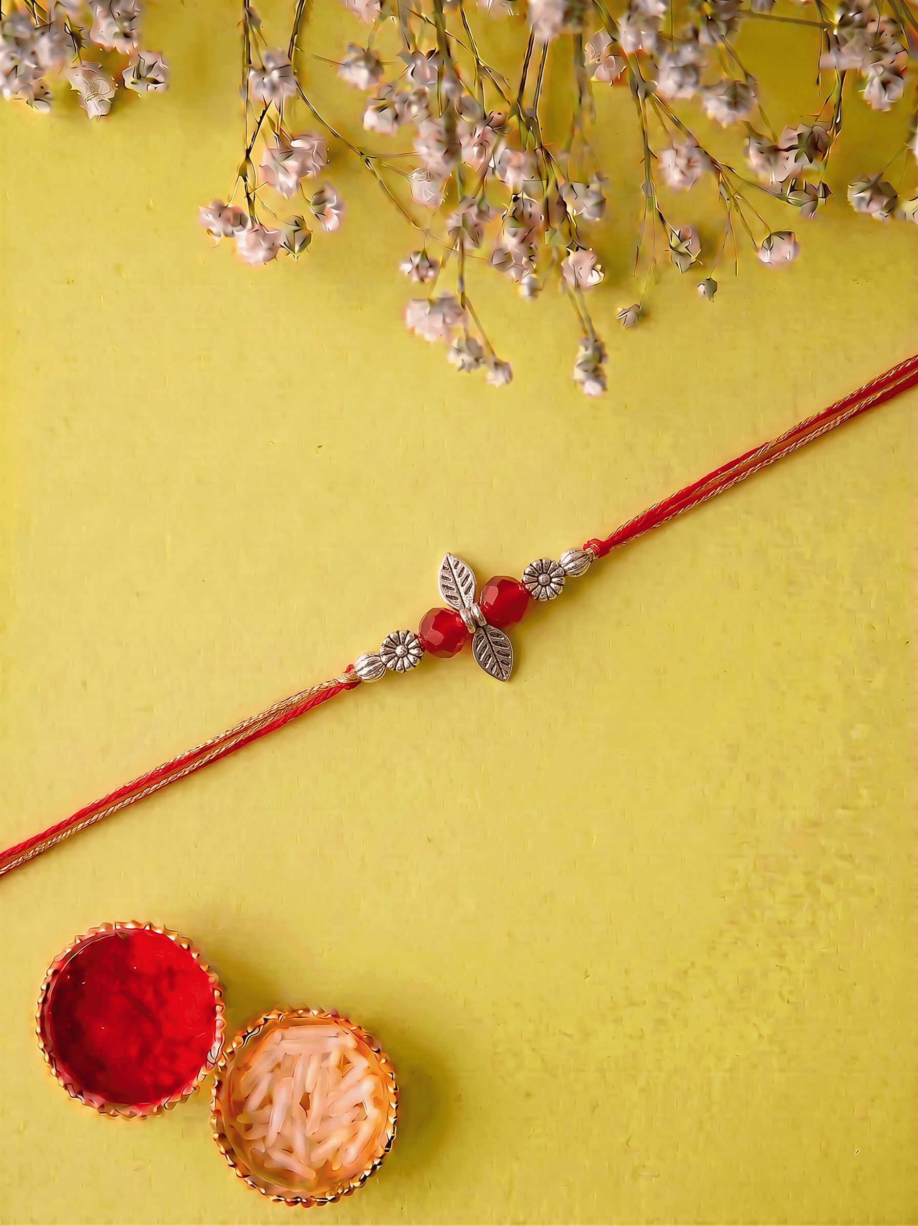 Stylish Gold Leaf with Red Crystal Beads Traditional Bhabhi Rakhi