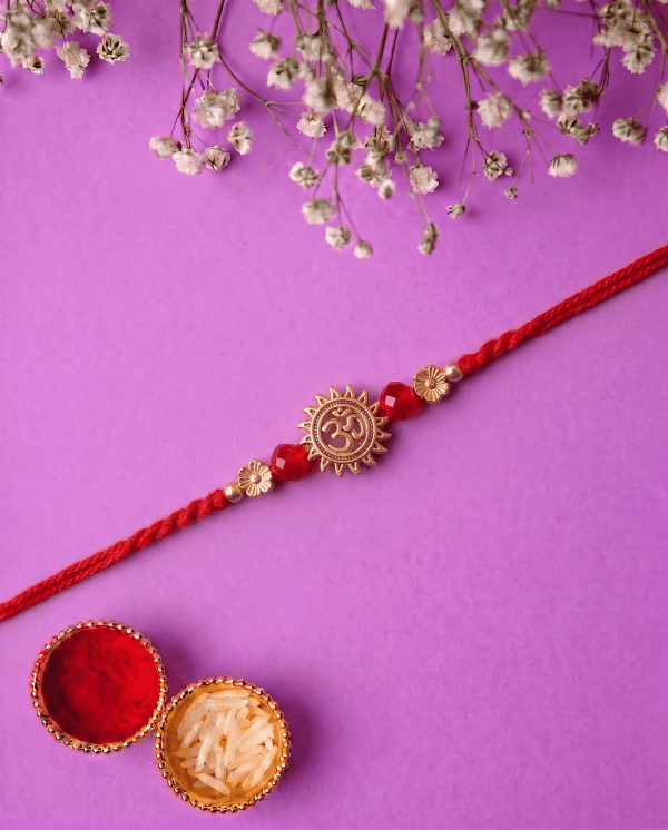 Traditional Om Symbol with Sacred Red Thread Bhai Rakhi