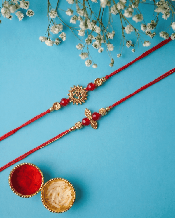 Traditional Om Symbol with Stylish Gold Leaf Designer Couple Rakhi Set